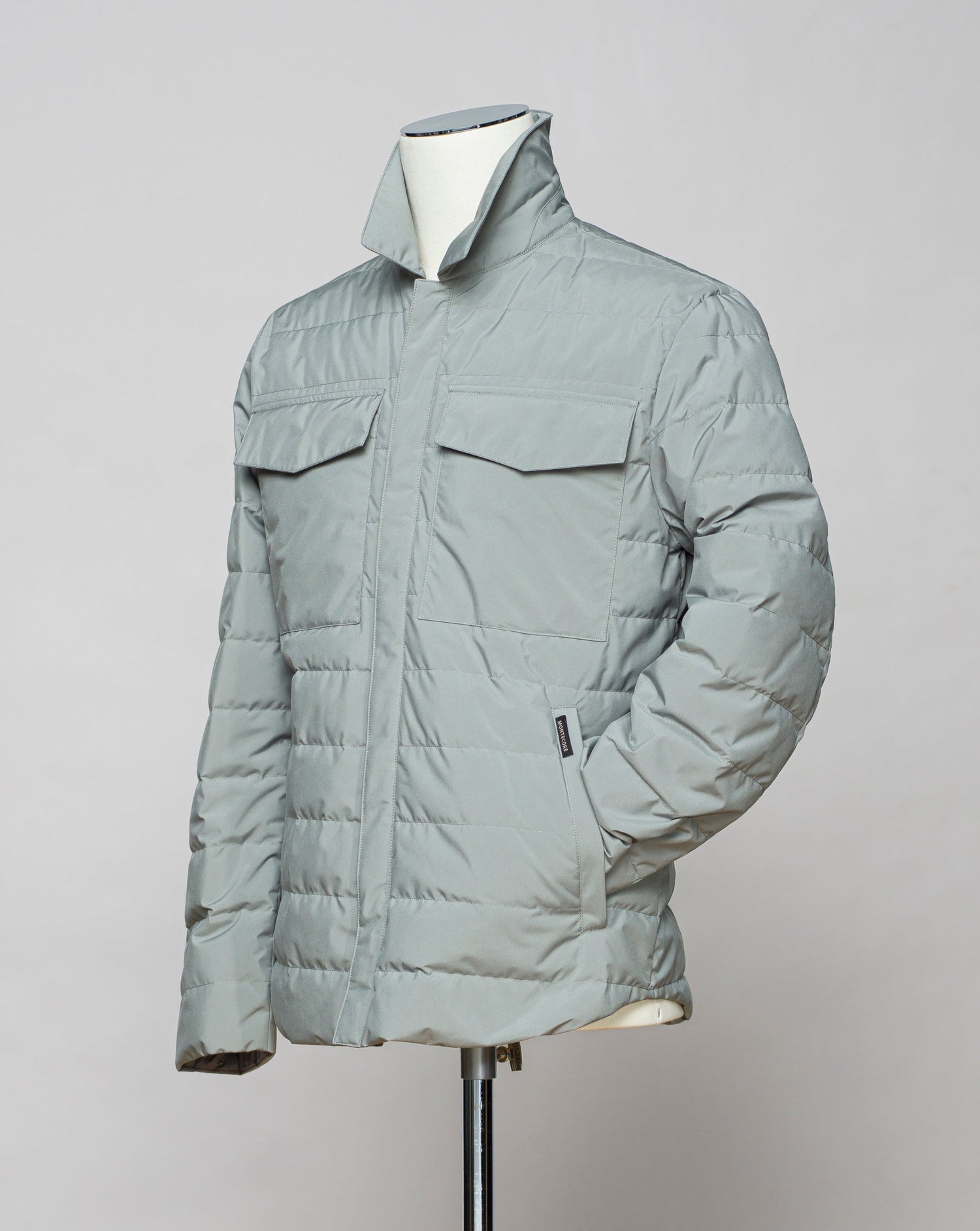 <ul> <li>Outer fabric: 100% Polyester</li> <li>Lining: 100% Polyamide</li> <li>Filling: 90% Down 10% Feathers</li> <li>Color: Sage Green / 37</li> <li>Article: S06MUCX777</li> </ul>