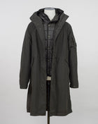 Military inspired long parka coat. 50 Fili -fabric is a nylon/cotton mix derived from American field parkas. The polyurethane coating makes it ideal for hardwearing outerwear. Garment dyed for an increased chromatic depth and intensity throughout. Article: 15CMOW276A 005966G Color: 670 / Olive Night External fabric: 75% Cotton, 25% Polyamide / Nylon Lining: 100% Cotton Coating: 100% Polyurethan 