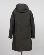 Military inspired long parka coat. 50 Fili -fabric is a nylon/cotton mix derived from American field parkas. The polyurethane coating makes it ideal for hardwearing outerwear. Garment dyed for an increased chromatic depth and intensity throughout. Article: 15CMOW276A 005966G Color: 670 / Olive Night External fabric: 75% Cotton, 25% Polyamide / Nylon Lining: 100% Cotton Coating: 100% Polyurethan 
