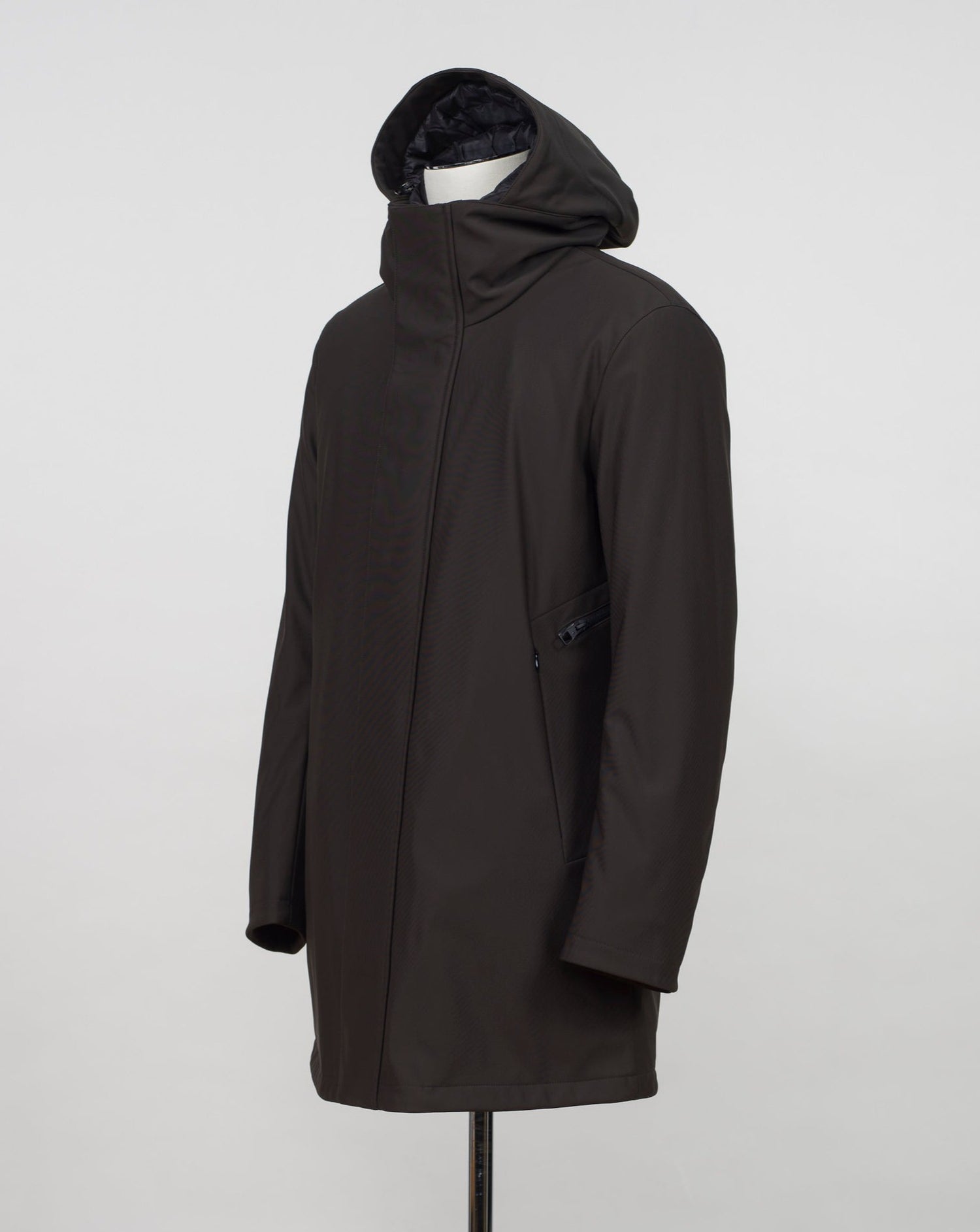 Montecore down insulated parka with technical external fabric. Waterproof, breathable, wind stoping.  Model: F05MUCX512 Color: 31 / Dark Brown Fabric: 42% pl 36% pa 13% ea 9%pu Lining 100% pa (nylon) 4 zippered pockets in front 4 zippered inside pockets Adjustable hood Zip and snap fasteners closure in front
