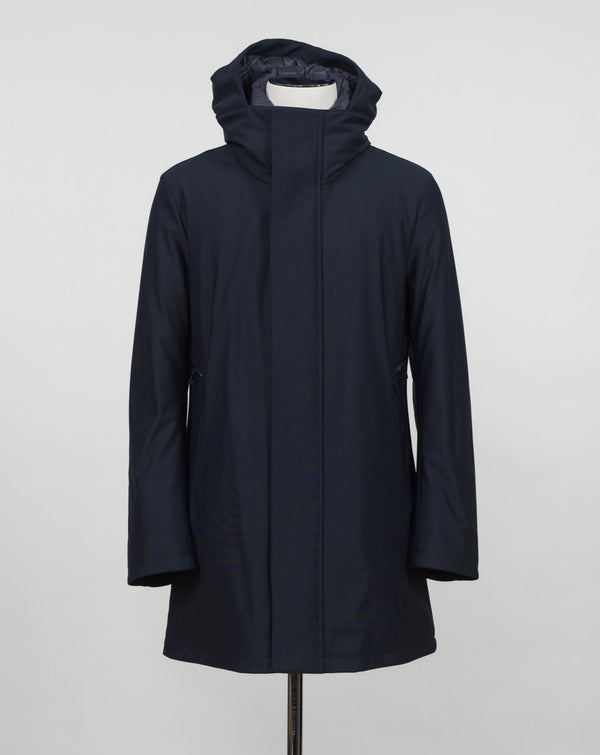 Montecore down insulated parka with technical external fabric. Waterproof, breathable, wind stoping.  Model: F05MUCX512 Color: 89 / Navy Fabric: 42% pl 36% pa 13% ea 9%pu Lining 100% pa (nylon) 4 zippered pockets in front 4 zippered inside pockets Adjustable hood Zip and snap fasteners closure in front