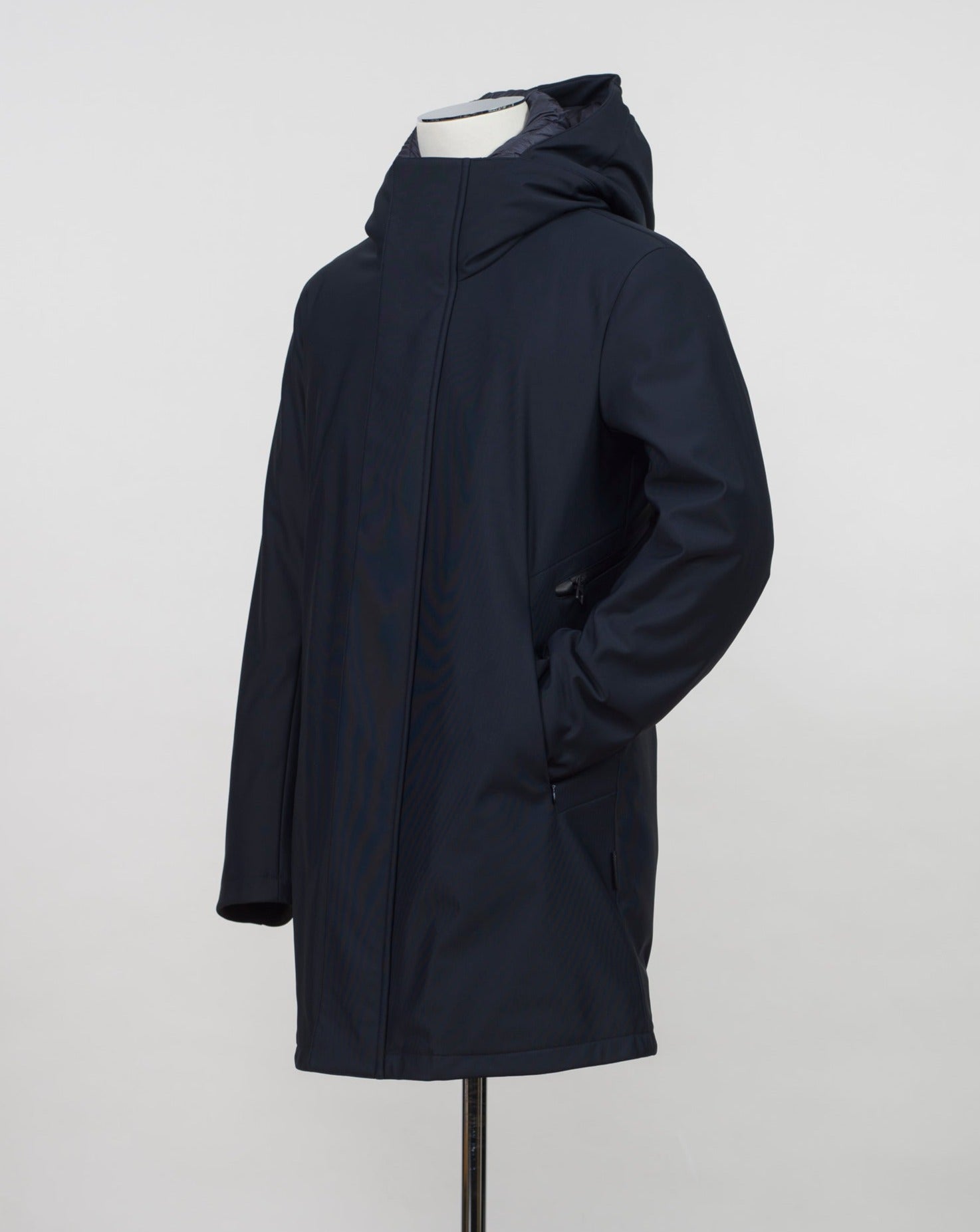 Montecore down insulated parka with technical external fabric. Waterproof, breathable, wind stoping.  Model: F05MUCX512 Color: 89 / Navy Fabric: 42% pl 36% pa 13% ea 9%pu Lining 100% pa (nylon) 4 zippered pockets in front 4 zippered inside pockets Adjustable hood Zip and snap fasteners closure in front