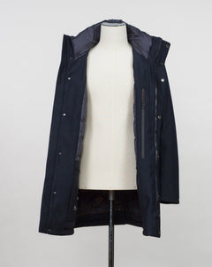 Montecore down insulated parka with technical external fabric. Waterproof, breathable, wind stoping.  Model: F05MUCX512 Color: 89 / Navy Fabric: 42% pl 36% pa 13% ea 9%pu Lining 100% pa (nylon) 4 zippered pockets in front 4 zippered inside pockets Adjustable hood Zip and snap fasteners closure in front