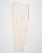Sartorial denim Model: Portobello Article: 423196 Composition: 99% Cotton 1% Pleated front Carrot fit Made in Italy Elastan Briglia Cotton Trousers / Natural White