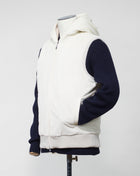 Col 005 Off White / Panna Fixed hood 2 way zip in front 2 hand warming pockets in front Main fabric 100% cotton Ribbed hem and armholes 100% wool Thermo padding filling 100% polyester Made in Italy Gran Sasso Hooded Corduroy Vest / Off White