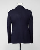 Model: 1SMC22K  Article: 340209 J Unlined  Unconstructed shoulder  Composition: 40% Polyester 30% Virgin Wool 30% Acrylic Color: B1109 / Navy Made in Martina Franca, Italy Tagliatore Knit Jersey Jacket / Navy