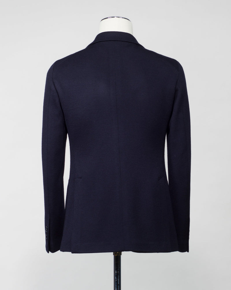 Model: 1SMC22K  Article: 340209 J Unlined  Unconstructed shoulder  Composition: 40% Polyester 30% Virgin Wool 30% Acrylic Color: B1109 / Navy Made in Martina Franca, Italy Tagliatore Knit Jersey Jacket / Navy