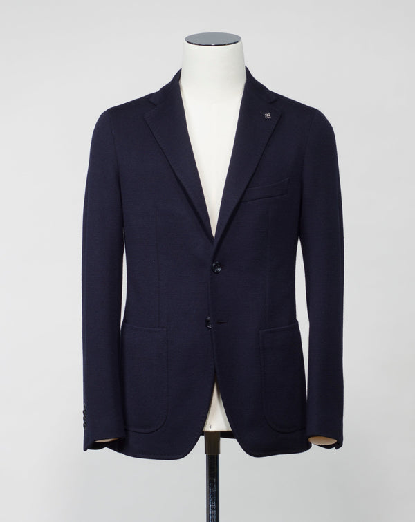 Model: 1SMC22K  Article: 340209 J Unlined  Unconstructed shoulder  Composition: 40% Polyester 30% Virgin Wool 30% Acrylic Color: B1109 / Navy Made in Martina Franca, Italy Tagliatore Knit Jersey Jacket / Navy
