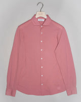 Gran Sasso long sleeved jersey shirt made of fine jersey cotton. Soft semi cutaway collar, 100% cotton. Great piece for easy going but chic summer outfits. 100% Cotton Art. 60120/81402 Col. 218 / Dusty Rosa Long Sleeves Made in Italy Gran Sasso Cotton Jersey Shirt / Dusty Rosa