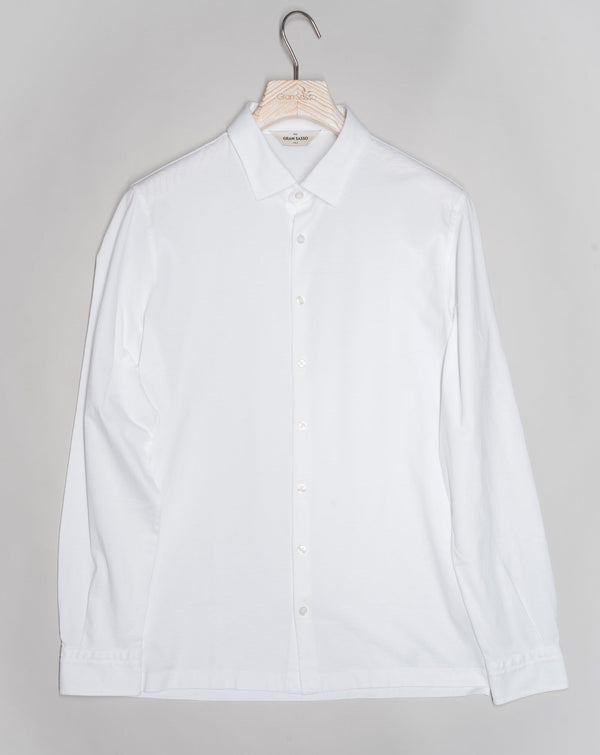 Gran Sasso long sleeved jersey shirt made of fine jersey cotton. Soft semi cutaway collar,  100% cotton. Great piece for easy going but chic summer outfits.  Gran Sasso Knitted  Article: 60120  Quality: 81402   Color:  815 White Made in Italy