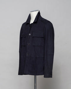 <ul> <li>Composition: 100% Leather (Goatskin)</li> <li>Horn Buttons</li> <li>Color: 575 / Dark Navy</li> <li>Style: Henri</li> </ul>