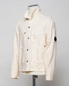 <ul> <li>Button fastening in front</li> <li>3 patch pocekts in front</li> <li>2 slanted pockets with snap fasteners in front</li> <li>1 inside pocket with snap fastener</li> <li>Article: 16CMOS277A 006273G</li> <li>Composition: 60% Cotton 40% Linen</li> <li>Color: 402 / Pistachio Shell (Crema)</li> </ul>