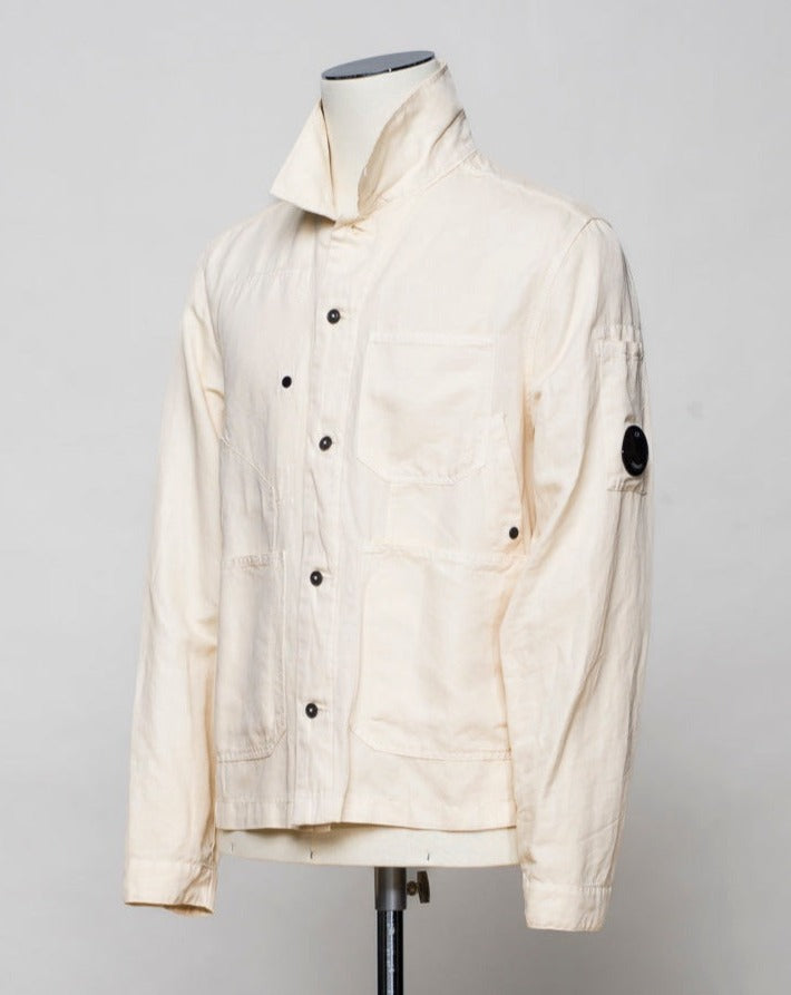 <ul> <li>Button fastening in front</li> <li>3 patch pocekts in front</li> <li>2 slanted pockets with snap fasteners in front</li> <li>1 inside pocket with snap fastener</li> <li>Article: 16CMOS277A 006273G</li> <li>Composition: 60% Cotton 40% Linen</li> <li>Color: 402 / Pistachio Shell (Crema)</li> </ul>