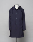 <ul> <li>Hooded raincoat </li> <li>Detachable hood</li> <li>Slanted side pockets</li> <li>100% polyester</li> <li>Waterproof</li> <li>Taped seams</li> <li>Double faced fabric (beige color inside)</li> <li>Color: Navy 9220</li> </ul> <p> </p>