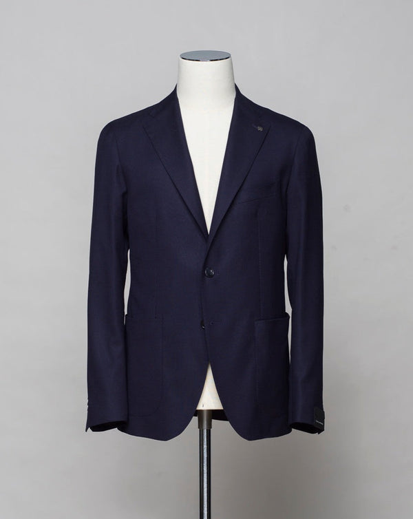 <ul> <li>Composition: 99% Virgin wool super 110's 1% Elastan<meta charset="utf-8"></li> <li>Modello: Monte Carlo / 1SMC22K</li> <li>Color: Navy / B5040</li> <li>Unconstructed shoulder</li> <li>Unlined</li> <li>2 Buttons</li> <li>Notch lapel</li> <li>Patch pockets</li> <li>Side vents</li> <li>Made in Martina Franca, Italy</li> </ul>