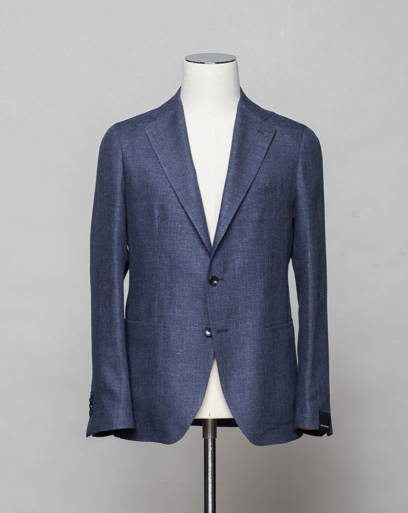Composition: 60% Linen 40% Virgin Wool. Modello: Monte Carlo / 1SMC22K. Color: Mid Blue / B3146. Unconstructed shoulder. Unlined. 2 Buttons. Notch lapel. Patch pockets. Side vents. Made in Martina Franca, Italy