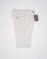 <div> <div>Berwich Morello with a little silk added to the fabric for a soft and luxurious touch.</div> <div>Great summer chinos.&nbsp;</div> </div> <ul> <li>Composition: 88% Cotton 10% Silk 2% Elastan</li> <li>Model: Morello-GD (Garment dyed)</li> <li>Article: tf0599x</li> <li>Color:&nbsp;Pomice</li> <li>Made in Martina Franca, Italy</li> </ul>