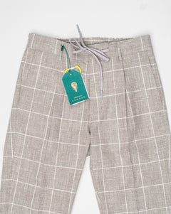 <ul> <li>Composition: 100% Cotton&nbsp;</li> <li>Article: ts1456x</li> <li>Model: Spiaggia 1p</li> <li>Color: Taupe</li> <li>Made in Martina Franca, Puglia, Italy Berwich Windowpane Cotton Trousers / Taupe</li> </ul>