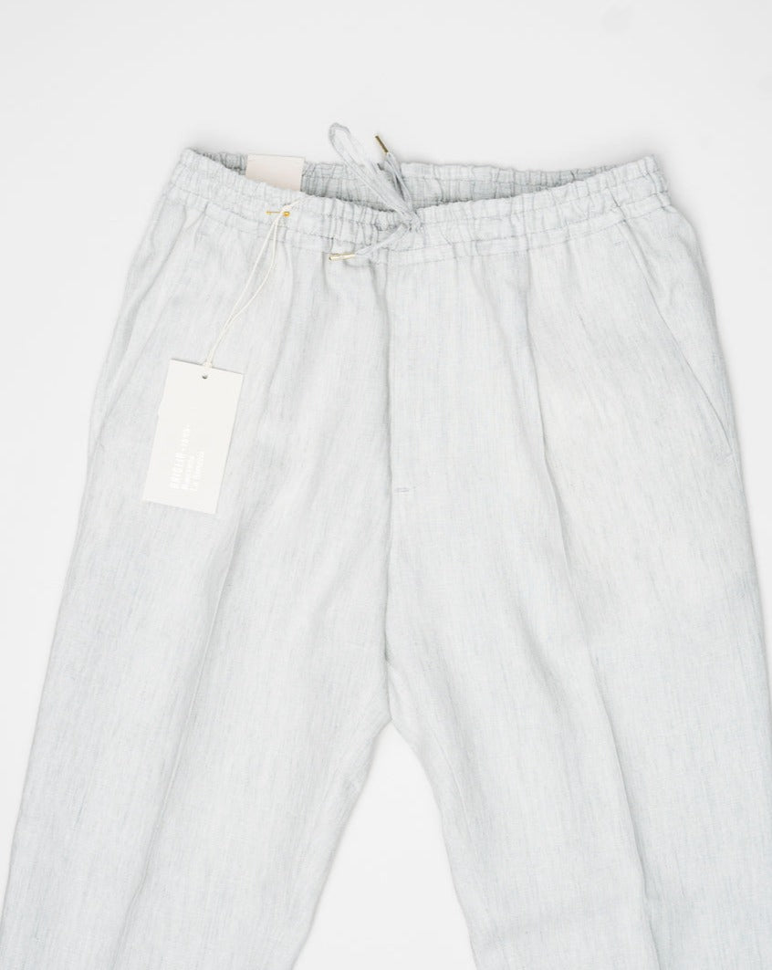 Article: 324118. Color: Light Grey / 40. Composition: 100% Linen. Single pleat. Slanted side pockets. Drawstring. Made in Naples, Italy
