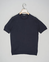 Expertly crafted from luxurious silk, the Gran Sasso Silk Knit T-Shirt Shirt offers a sophisticated and luxurious addition to any wardrobe. The high-quality silk knit fabric ensures a comfortable and breathable fit, while the classic t-shirt design adds a touch of timeless elegance. Elevate your style with this must-have piece.
Composition: 100% Silk
Color: 597 / Navy
Article: 43112 / 23503
Made in Italy