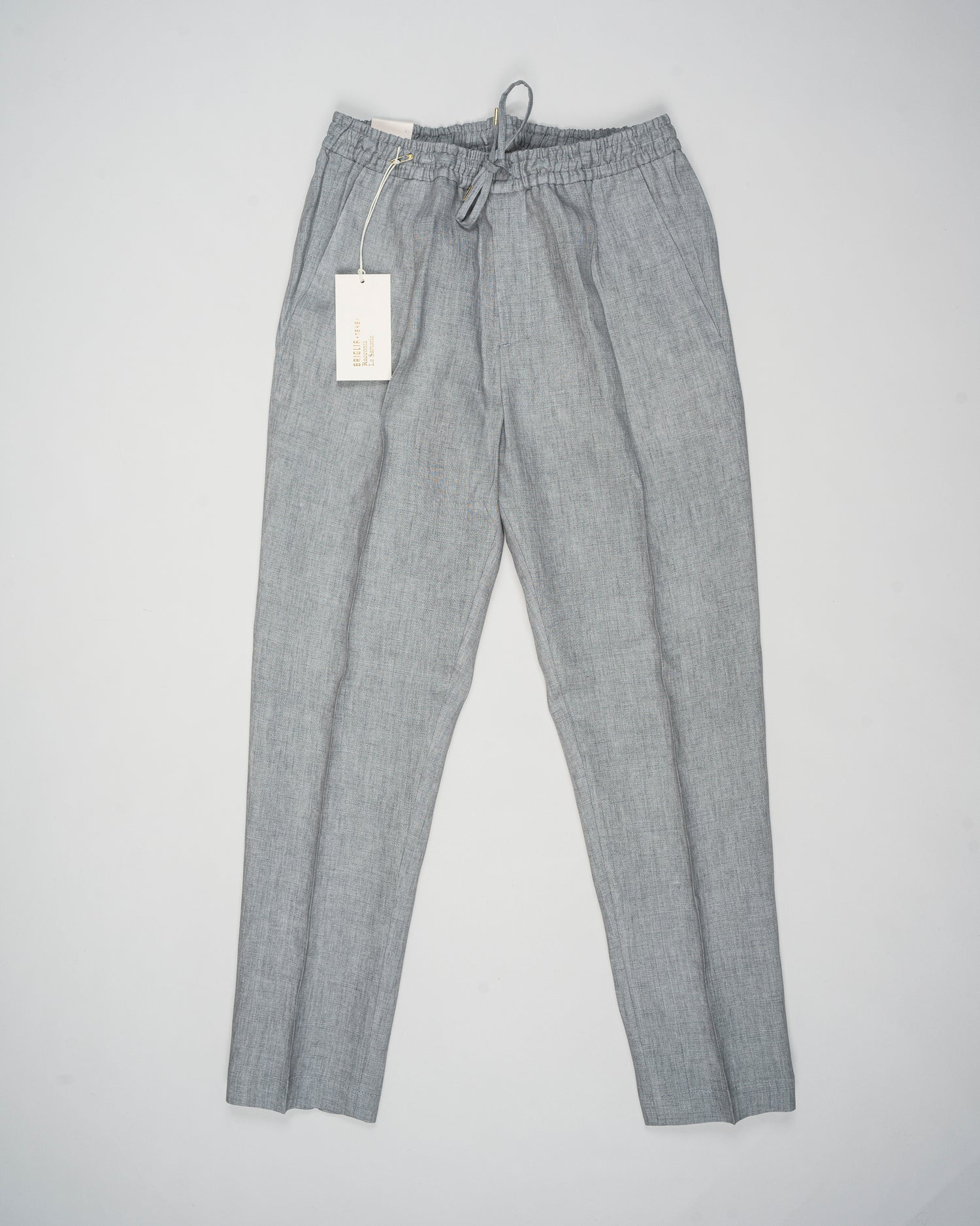 Article: 325118
Color: Light Grey / 60
Composition: 100% Linen
Single pleat
Slanted side pockets
Drawstring
Made in Naples, Italy