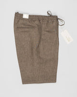 Article: 325118
Color: Brown / 00046
Composition: 100% Linen
Single pleat
Slanted side pockets
Drawstring
Made in Naples, Italy