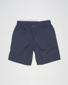 Swim shorts in ultra-lightweight, breathable stretch nylon.
Boasting a classic shape and elasticated waist for maximum comfort, this model combines style and functionality to enhance your casual wardrobe.




Regular fit

Elastic with drawstring waist

Side pockets

Patch pocket on the back
Color: 9201 / Navy
Article: CST00002U 12691Z