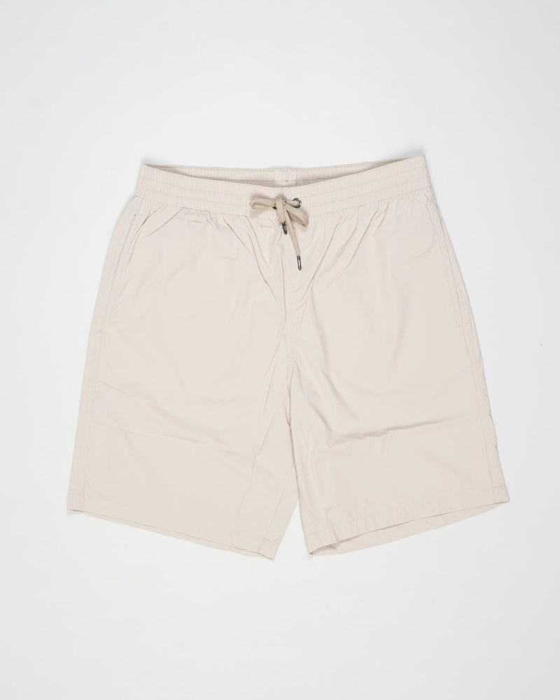 Swim shorts in ultra-lightweight, breathable stretch nylon.
Boasting a classic shape and elasticated waist for maximum comfort, this model combines style and functionality to enhance your casual wardrobe.




Regular fit

Elastic with drawstring waist

Side pockets

Patch pocket on the back
Color: 1985 / Light Beige (Chantilly)
Article: CST00002U 12691Z