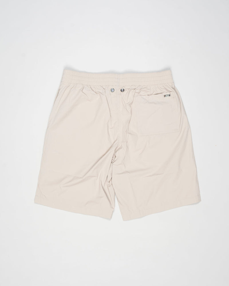 Swim shorts in ultra-lightweight, breathable stretch nylon.
Boasting a classic shape and elasticated waist for maximum comfort, this model combines style and functionality to enhance your casual wardrobe.




Regular fit

Elastic with drawstring waist

Side pockets

Patch pocket on the back
Color: 1985 / Light Beige (Chantilly)
Article: CST00002U 12691Z