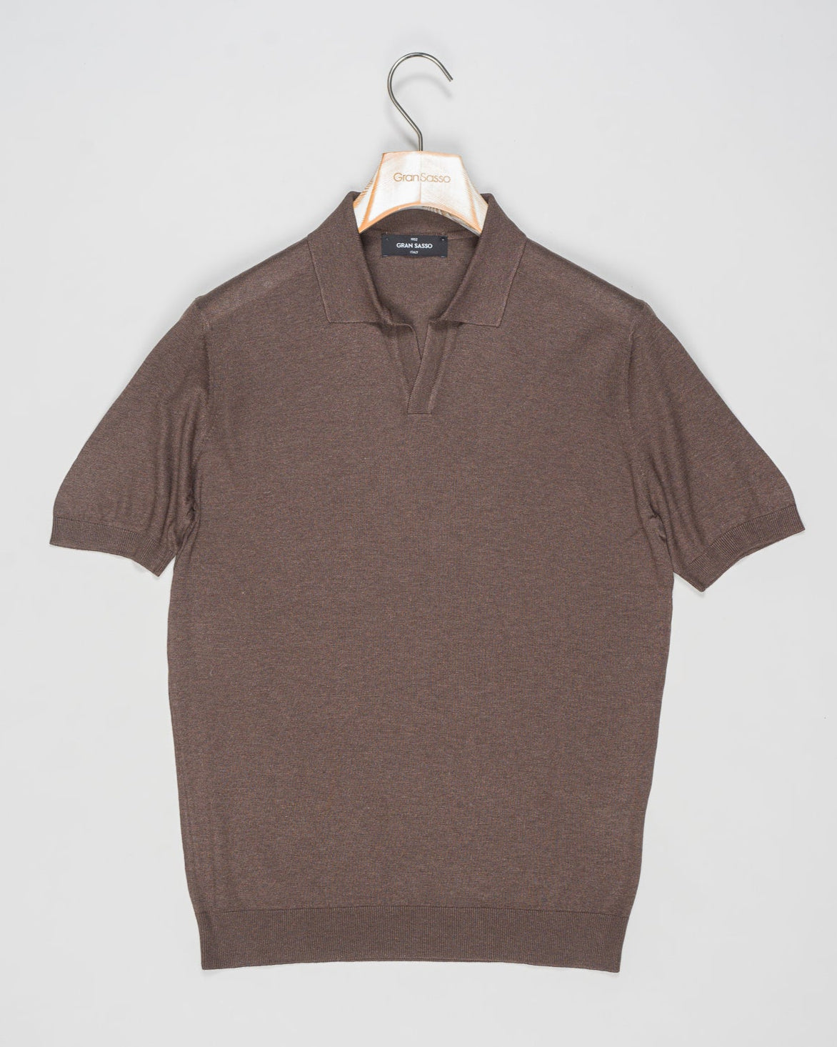 Expertly crafted from luxurious silk, the Gran Sasso Capri Collar Silk Knit Polo Shirt offers a sophisticated and luxurious addition to any wardrobe. The high-quality silk knit fabric ensures a comfortable and breathable fit, while the classic polo shirt design adds a touch of timeless elegance. Elevate your style with this must-have piece.
Composition: 100% Silk
Color: 184 / Brown
Article: 43129 / 23503
Made in Italy