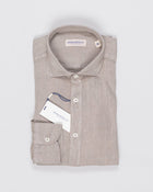 Cutaway collar
Curved hem
Front placket
100% linen
Art. TC 162
Mod. 64/TC
Collar B878
Color: 215 Taupe