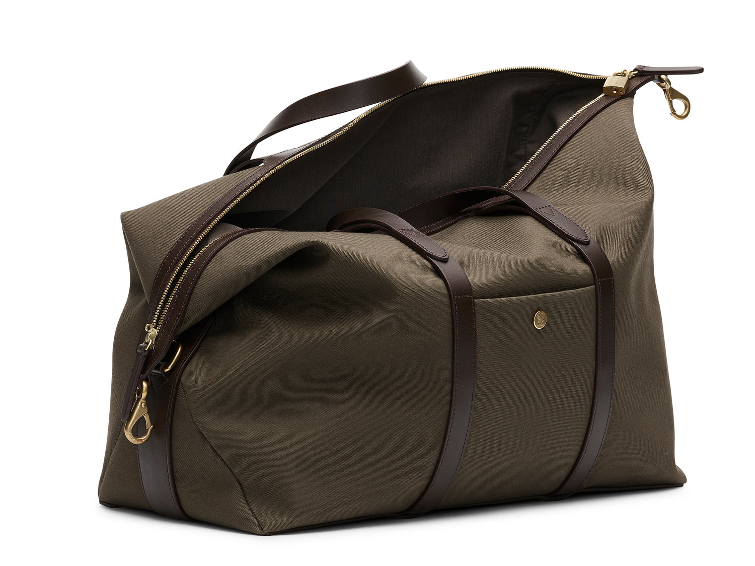 Measurements:  L: 47  H: 29  W: 24cm Body: Tight-woven cotton canvas Fabric composition: CO 94% PU 4% PC 2% - 709 gr/rm Trimmings: Dark brown custom developed vegetable tanned full-grain bridle leather Lining: 100% cotton in army colour  Hardware: Solid brass with varnish protection  Zipper: Hand polished YKK Excella travelling cosmopolitan, the M/S Avail is our latest take on a weekender that seamlessly merges style and function in a compact shape with enough room to easily hold a weekend