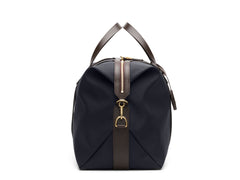 Measurements:   L: 47  H: 29  W: 24cm Body: Hard-woven nylon (waterproof) Fabric composition:  PA 42% CO 38% PU 20% / 826 gr./rm Trimmings: Dark brown custom developed vegetable tanned full-grain bridle leather Lining: 100% cotton in army colour  Hardware: Solid brass with varnish protection  Zipper: Hand polished YKK Excella Art. No. MS861319 Built for the travelling cosmopolitan, the M/S Avail is our latest take on a weekender that seamlessly merges style and function in a compact shape with enough room 
