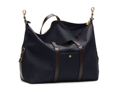Measurements:   L: 47  H: 29  W: 24cm Body: Hard-woven nylon (waterproof) Fabric composition:  PA 42% CO 38% PU 20% / 826 gr./rm Trimmings: Dark brown custom developed vegetable tanned full-grain bridle leather Lining: 100% cotton in army colour  Hardware: Solid brass with varnish protection  Zipper: Hand polished YKK Excella Art. No. MS861319 Built for the travelling cosmopolitan, the M/S Avail is our latest take on a weekender that seamlessly merges style and function in a compact shape with enough room 