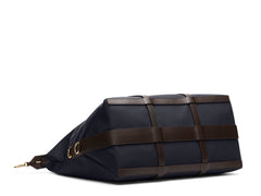 Measurements:   L: 47  H: 29  W: 24cm Body: Hard-woven nylon (waterproof) Fabric composition:  PA 42% CO 38% PU 20% / 826 gr./rm Trimmings: Dark brown custom developed vegetable tanned full-grain bridle leather Lining: 100% cotton in army colour  Hardware: Solid brass with varnish protection  Zipper: Hand polished YKK Excella Art. No. MS861319 Built for the travelling cosmopolitan, the M/S Avail is our latest take on a weekender that seamlessly merges style and function in a compact shape with enough room 