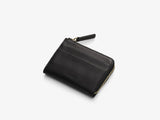 A small and very practical zip wallet with the cardholders placed on the outside of large internal compartment that can be used just as easily for credit cards and receipts as for coins and cash notes. Has a gusset underlay in leather to prevent the wallet from opening more than 90 degrees L: 10,2   H: 8   W: 2cm Body: Vegetable tanned full-grain cow leather Vegetable tanned full-grain cow leather Cotton/nylon stripe lining in off white/anthracite Zipper: YKK Excella Art. No. FG040118
