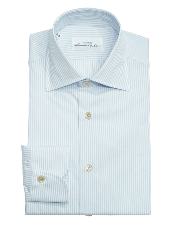 These are truly great shirts.&nbsp;We have seen a lot of shirts along the way and Avino stole our hearts straight away.&nbsp;Love on first try.

Tailored fit. This means between slim and classic fit.
Fits true to the size. If in doubt of your size, please contact us HERE
100% cotton
Semi spread collar
Single, rounder cuff
3242 P240285/05
Made in Italy
