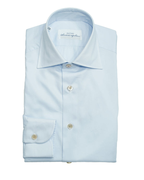 They feature &nbsp;eight beautifully hand crafted points. Hand attached collar and buttons, hand stitched button holes and armholes to mention a few. All this combined with&nbsp;quality fabrics make up a superior shirt.

These are truly great shirts. We have seen a lot of shirts along the way and Avino stole our hearts straight away.&nbsp;Love on first try.


Tailored fit. This means between slim and classic fit
Fits true to the size. If in doubt of your size, please contact us HERE
100% cotton
Semi spread 
