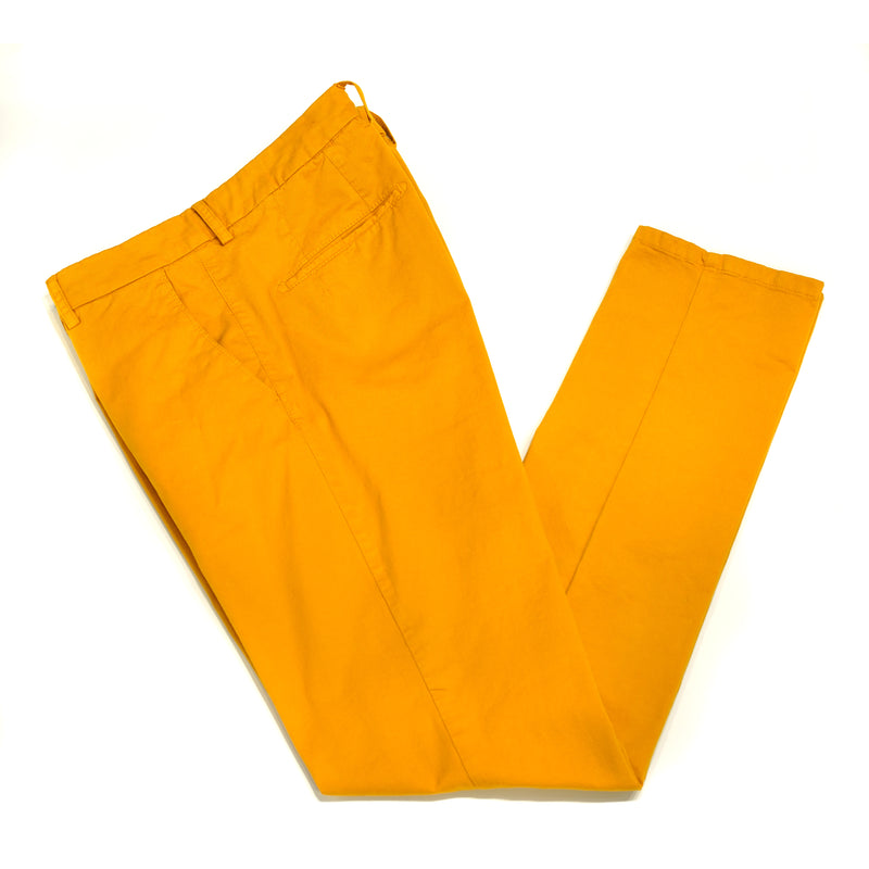 This kind of cotton trouser are one of the corner stones of every man’s casual wardrobe, the slim fit chino. These are made in a slim cut and garment dyed and washed which give the trousers a beautiful and unique colour. These are the trousers that go with everything from t-shirts to jackets or even with both. 98% Cotton 2% Elastan Color: Saffron Yellow Button closure with zippered fly Slanted front pockets and two back pockets Model: SC Reg Article: ts0001x Made in Martina Franca, Italy