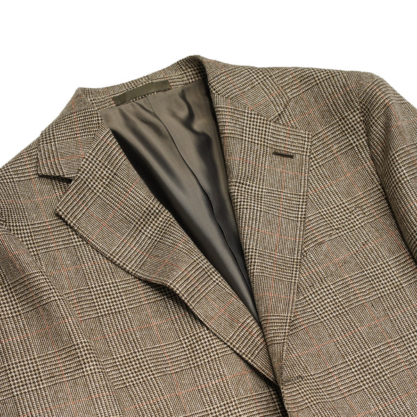 Caruso Aida jacket. Light brown glencheck pattern highlighted with delicate red over check. Wool,silk linen  Caruso represents the highest tailoring traditions Italy. handmade  full canvas structure inside. * Wool/SIlk/Linen mix summer jacket * Fully lined * Unconstructed shoulder * 3 roll 2 buttoning   * Side vents * Notch lapel * Patch pockets * Composition:  48% wool, 24% silk, 28% linen * Color: Light brown * Modello: Aida / ASM2JM304F * Article: 504541 * Colore: 0560 * Made in Italy