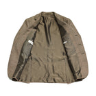 Caruso Aida jacket. Light brown glencheck pattern highlighted with delicate red over check. Wool,silk linen  Caruso represents the highest tailoring traditions Italy. handmade  full canvas structure inside. * Wool/SIlk/Linen mix summer jacket * Fully lined * Unconstructed shoulder * 3 roll 2 buttoning   * Side vents * Notch lapel * Patch pockets * Composition:  48% wool, 24% silk, 28% linen * Color: Light brown * Modello: Aida / ASM2JM304F * Article: 504541 * Colore: 0560 * Made in Italy