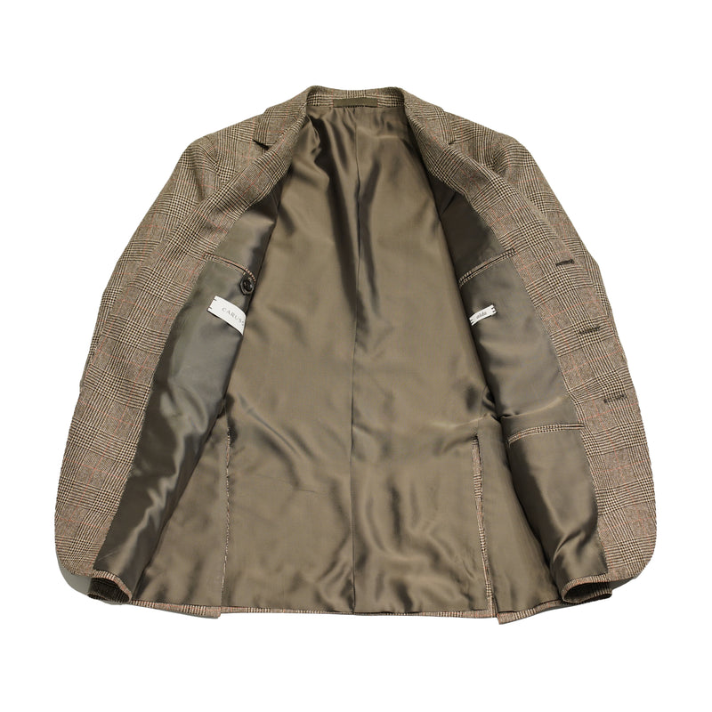 Caruso Aida jacket. Light brown glencheck pattern highlighted with delicate red over check. Wool,silk linen  Caruso represents the highest tailoring traditions Italy. handmade  full canvas structure inside. * Wool/SIlk/Linen mix summer jacket * Fully lined * Unconstructed shoulder * 3 roll 2 buttoning   * Side vents * Notch lapel * Patch pockets * Composition:  48% wool, 24% silk, 28% linen * Color: Light brown * Modello: Aida / ASM2JM304F * Article: 504541 * Colore: 0560 * Made in Italy
