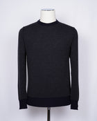 Crew neck 100% merino wool micro spotknit from G.R.P. Firenze. Spotknit is already a icon quality for G.R.P. and is a stable in our knitwear range.  100% Merino Wool  Long sleeves Art. SF TEC 2/14 BICOLOR  Col. Blu Notte / Antracite