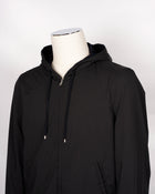 Gran Sasso Rain wool hooded knit. Garment (the fibres of the wool) has been treated with TEFLON™ fabric protector applied by Zegna Baruffa Lane Borgosesia. This gives the final product  water resistance in all conditions and also protects against dry dirt and the absorption of liquid substances, whether water or oil. Real added value!  Gran Sasso Rain Wool Hoodie Article: 57105/69301 Model: Giubbino Color: 598 / Navy Knit100% wool Outer layer 100% Pl Made in italy