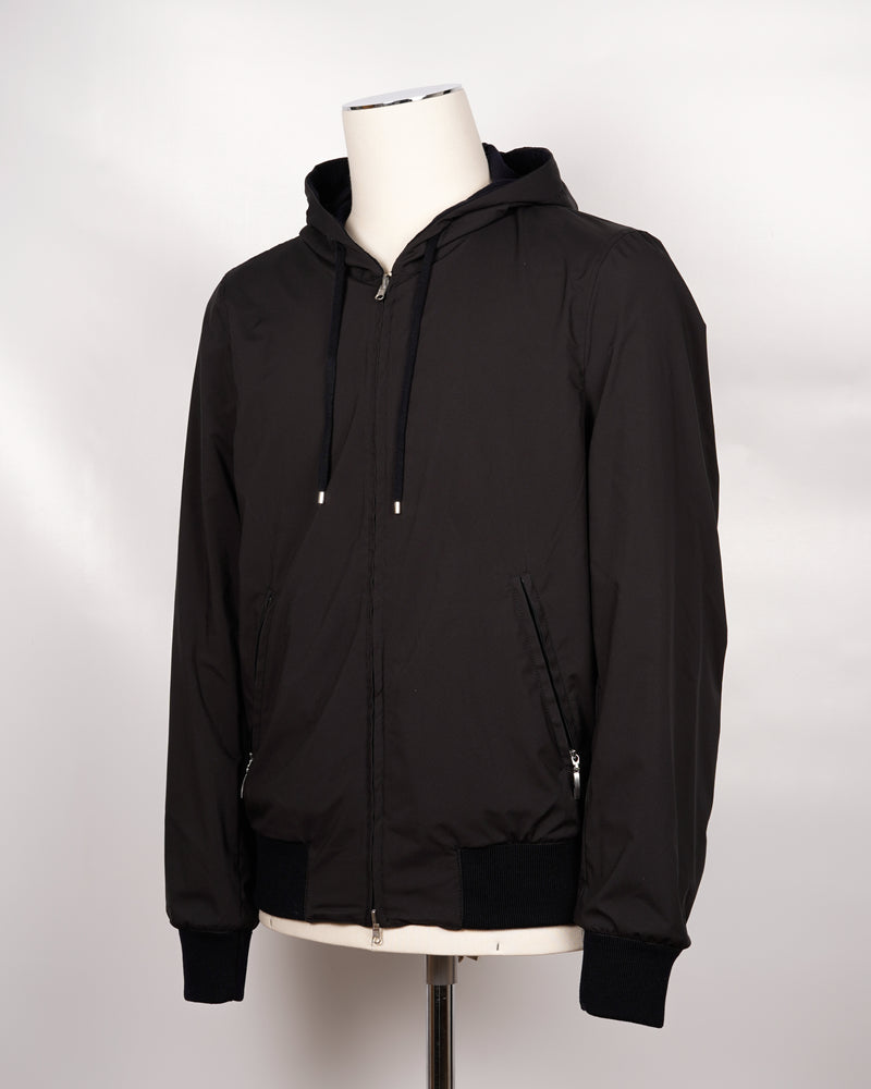 Gran Sasso Rain wool hooded knit. Garment (the fibres of the wool) has been treated with TEFLON™ fabric protector applied by Zegna Baruffa Lane Borgosesia. This gives the final product  water resistance in all conditions and also protects against dry dirt and the absorption of liquid substances, whether water or oil. Real added value!  Gran Sasso Rain Wool Hoodie Article: 57105/69301 Model: Giubbino Color: 598 / Navy Knit100% wool Outer layer 100% Pl