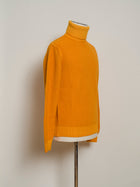 Beautifully heavy and robust merino wool roll neck knit.  100% Merino wool Art. D5M304PA Col.  268 / Bright Orange