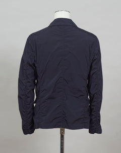 ed into a fibre fine enough to be used to weave Nycra.   CP Blazer  Nycra R MBZ250A00 5864G 888 Total Eclipse / Dark Blue 2 way zip + press studs in front 4 pockets in front with snap stud fastening Zippered pocket on left sleeve with C.P. Lens detailing Garment Dyed Quick Dry Stretch Multi filament