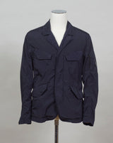 ed into a fibre fine enough to be used to weave Nycra.   CP Blazer  Nycra R MBZ250A00 5864G 888 Total Eclipse / Dark Blue 2 way zip + press studs in front 4 pockets in front with snap stud fastening Zippered pocket on left sleeve with C.P. Lens detailing Garment Dyed Quick Dry Stretch Multi filament