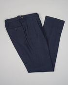 Slim fit Fits true to the size. If in doubt of your size, please contact us HERE Button closure 3 roll 2 buttoning, aka rollover Side vents 2 Patch pockets Composition:100%Linen 2 pleats in trousers front. Side Adjusters unfinished hem, needs to bee hemmed. Color: Navy / 6650 Linea: Gaiola Modello: GJ02 B2C Article: TP00808 Made in Naples, Italy