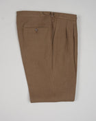 Slim fit Fits true to the size. If in doubt of your size, please contact us HERE Button closure 3 roll 2 buttoning, aka rollover Side vents 2 Patch pockets Composition:100%Linen 2 pleats in trousers front. Side Adjusters unfinished hem, needs to bee hemmed. Color: Brown / 8160 Linea: Gaiola Modello: GJ02 B2C Article: TS21094U Made in Naples, Italy